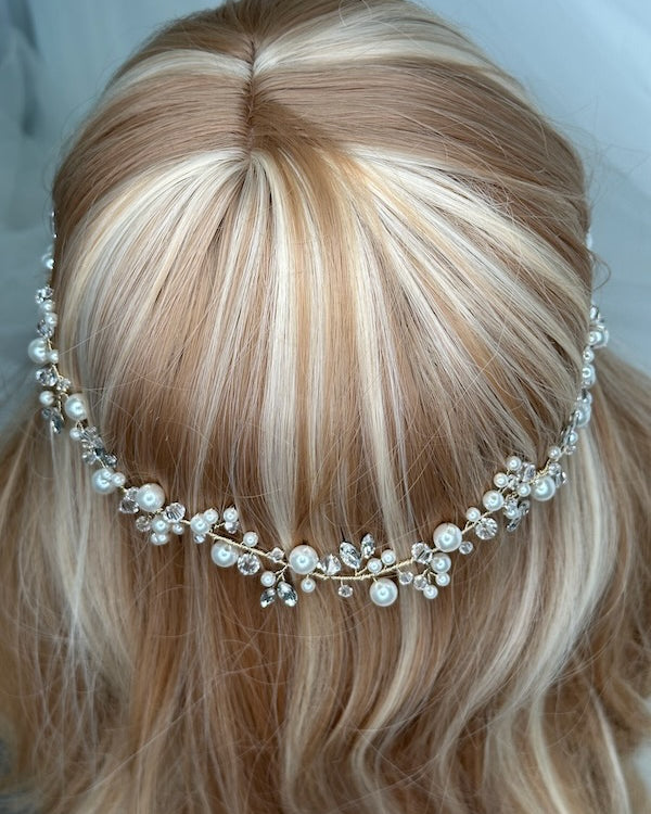 Bridal Vine single row with pearl and Swarovski crystal with gold wire worn on a model