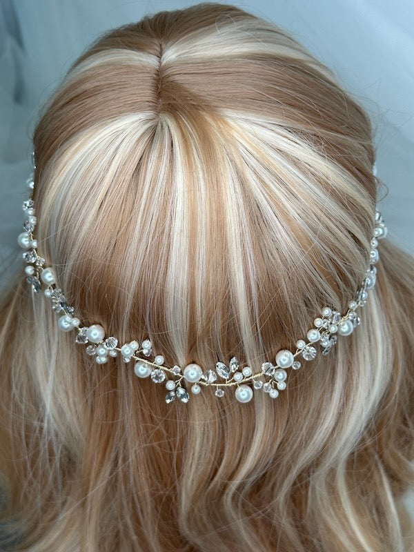 Bridal Vine single row with pearl and Swarovski crystal with gold wire worn on a model 