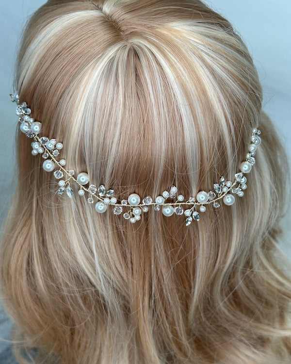 Bridal vine with crystal and pearl with gold wire worn on a model head