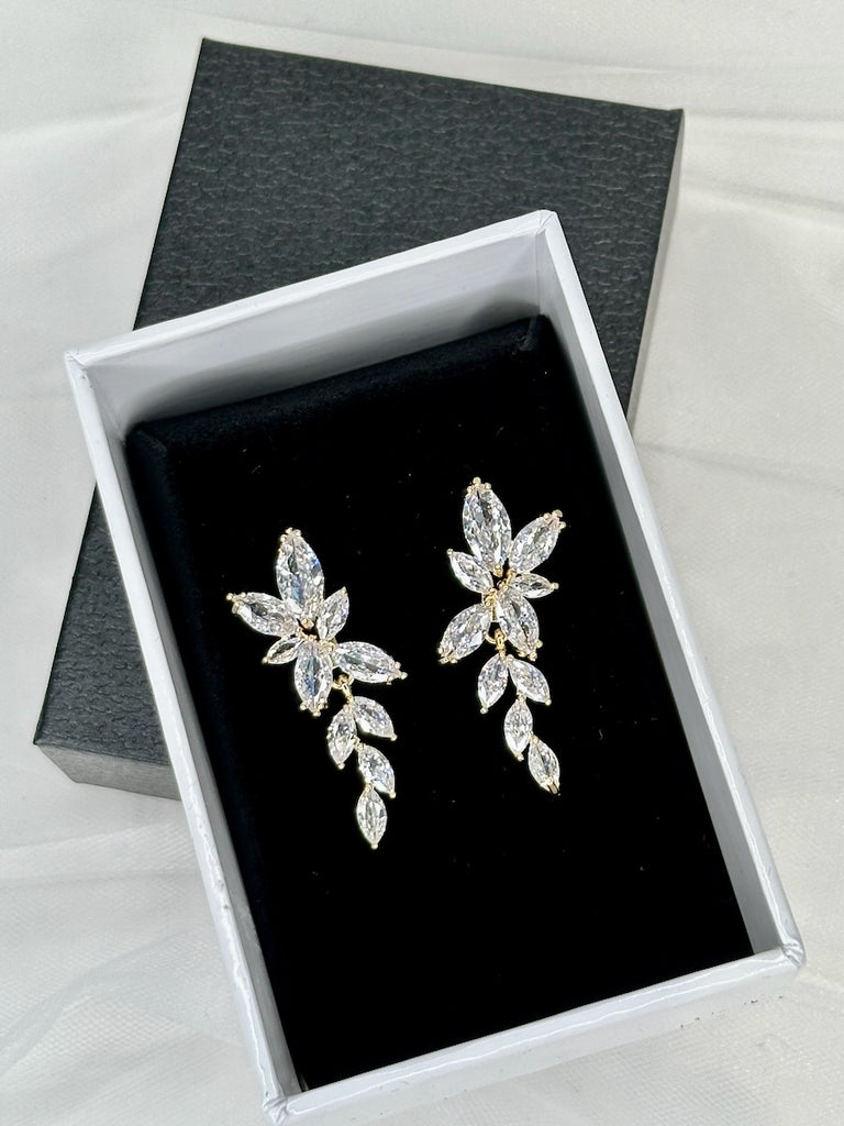 Bridal Earrings Gold Celia earrings on a black velvet base