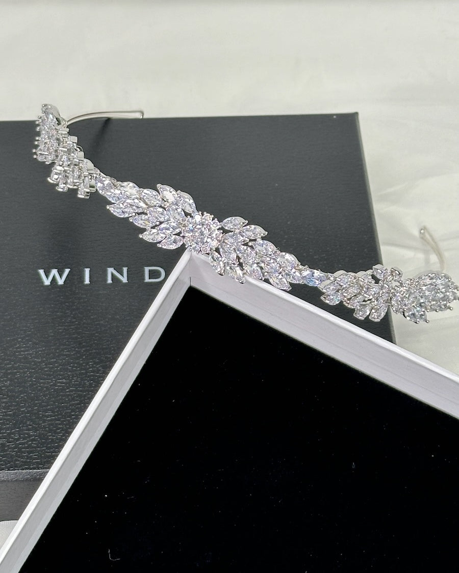 A modern bride headband silver crystal shown displayed in its box