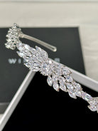 Close up of a modern bridal look headband in silver crystal