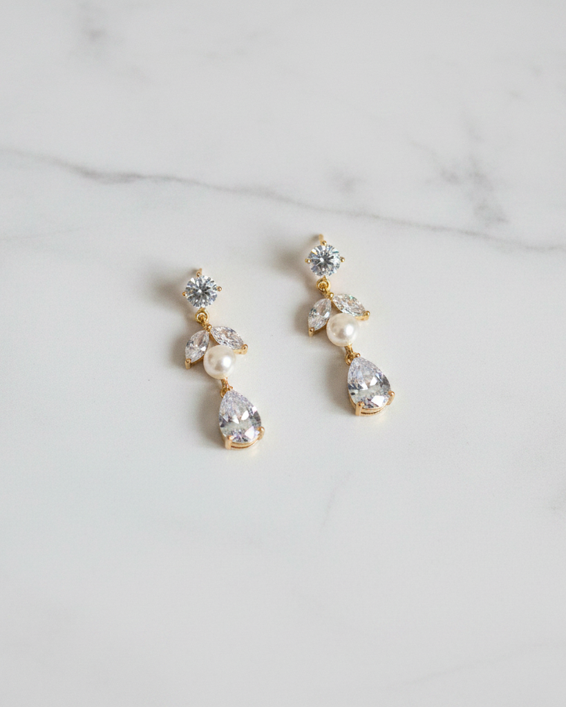 Bettie Gold Bridal Earring - white marble flat lay