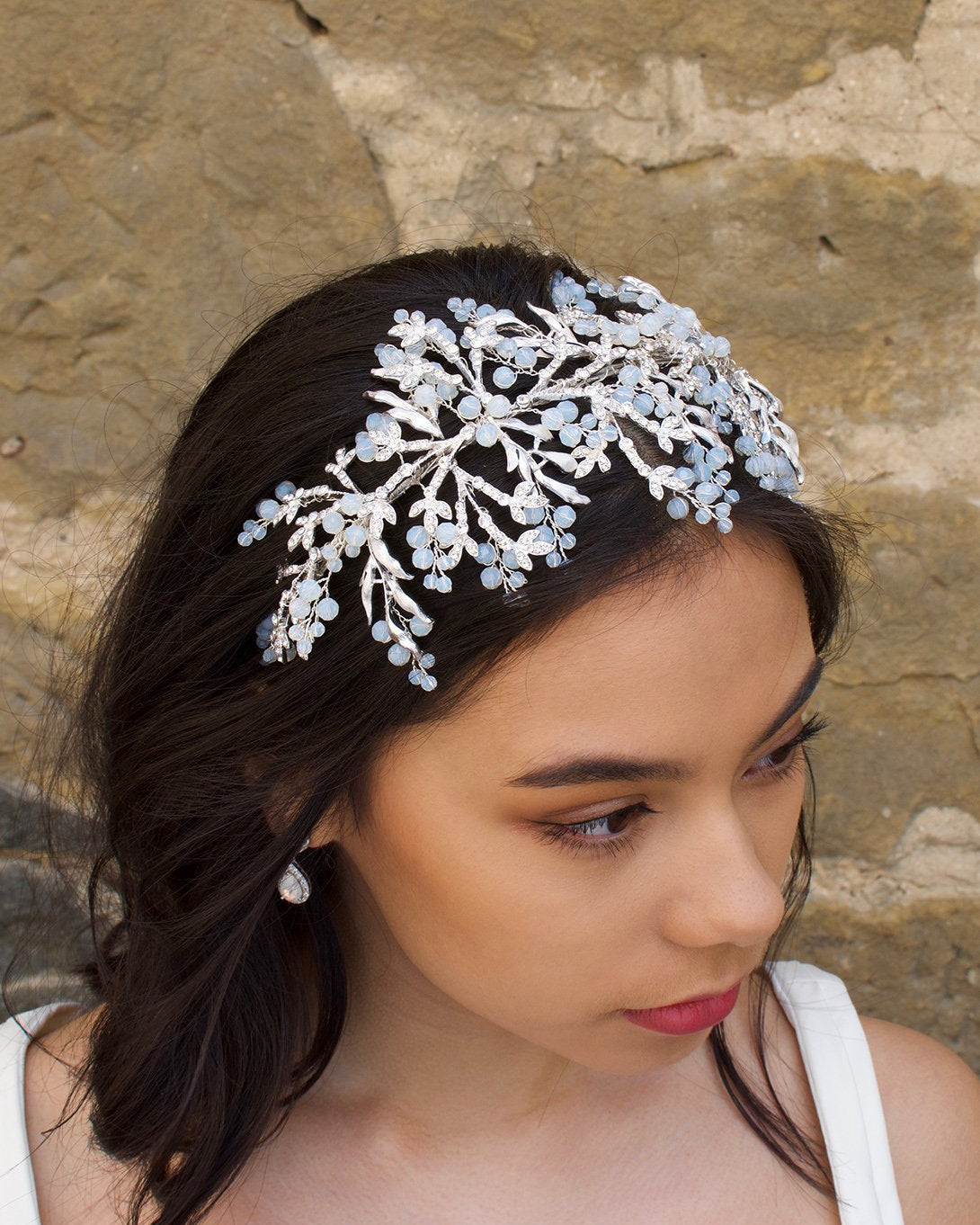 Wide Bridal Headband in Silver with white opal Swarovski beads worn by a bride