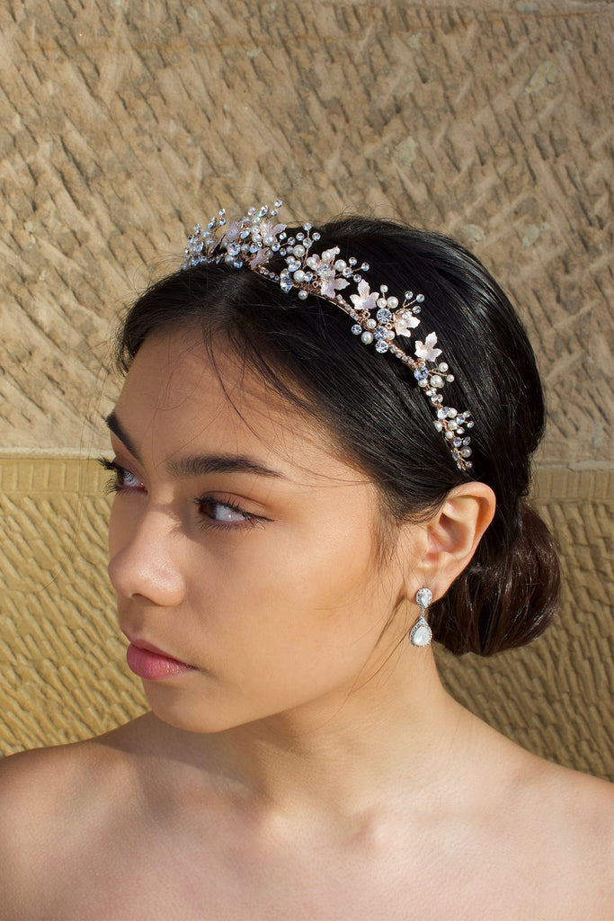 Low Bridal Crown in Rose Gold with pearls and stones worn by dark haired model