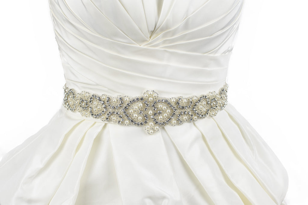 Pearls and Crystals Bridal belt on ivory satin ribbon worn on an ivory satin bridal gown