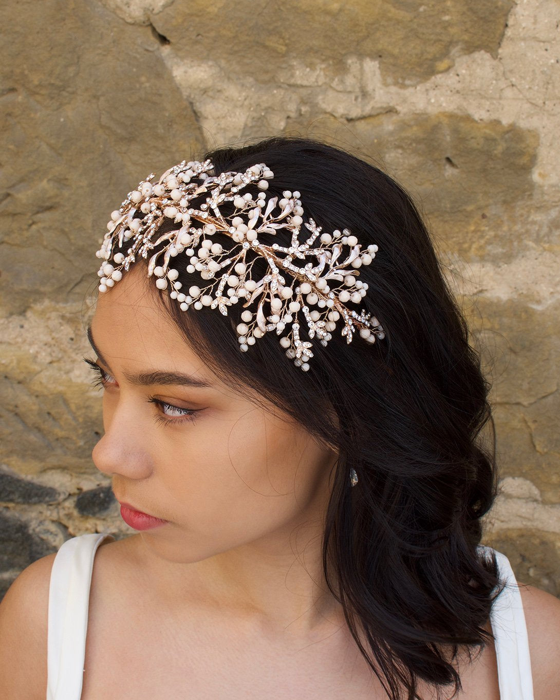 Rose Gold and Coral Colour wide headband worn by a bride
