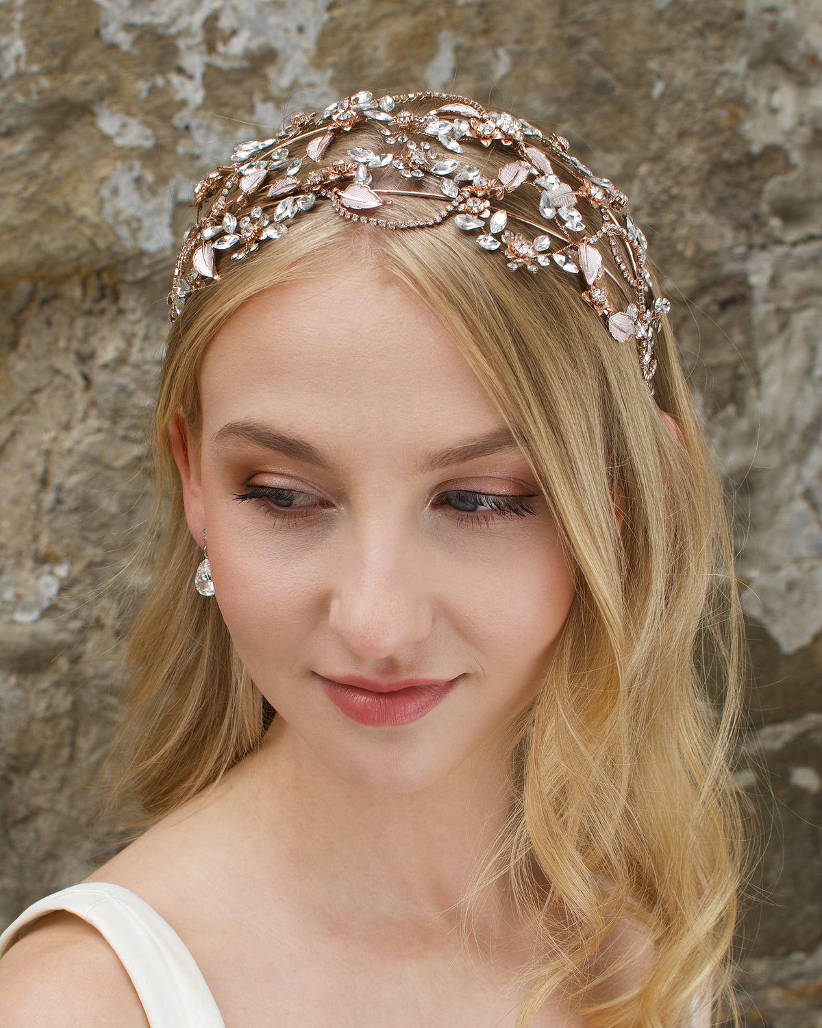 Wide Bridal Headband in Rose Gold worn by a bridal model