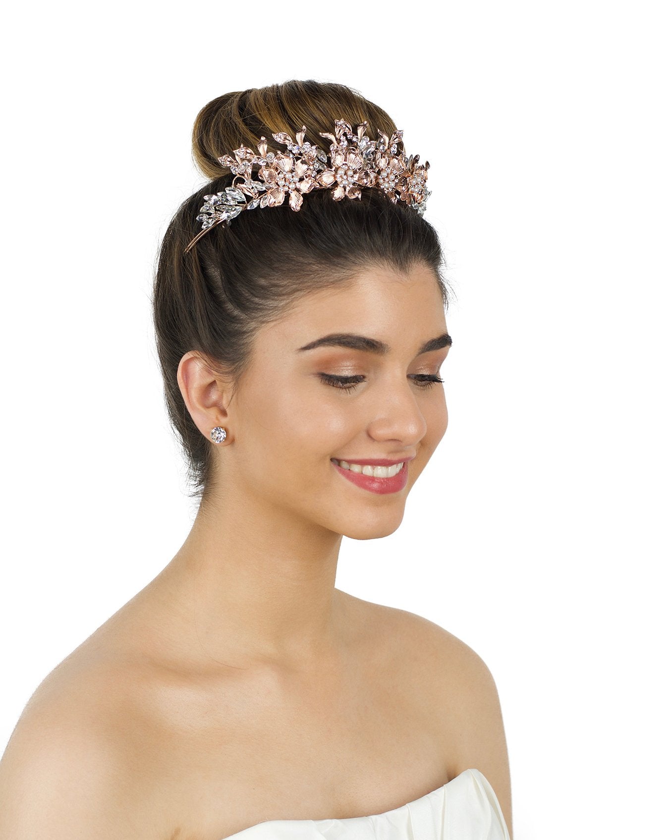 Rose Gold Flowers headpiece worn by a dark hair Bride with a white background