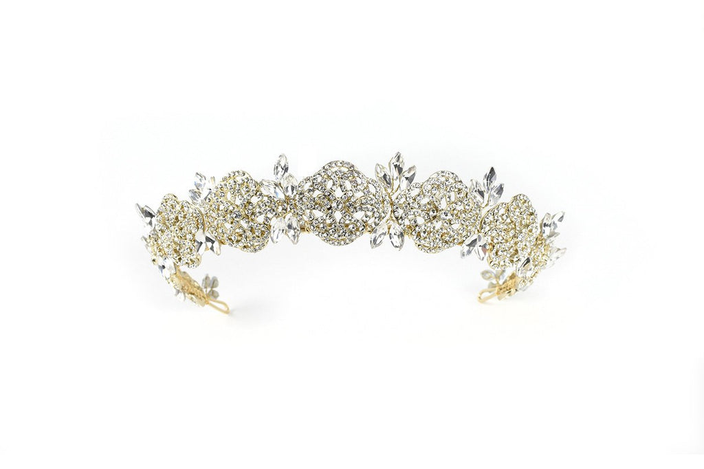 A Pale Gold crown against a bright white background. It has a full cover of tiny crystals