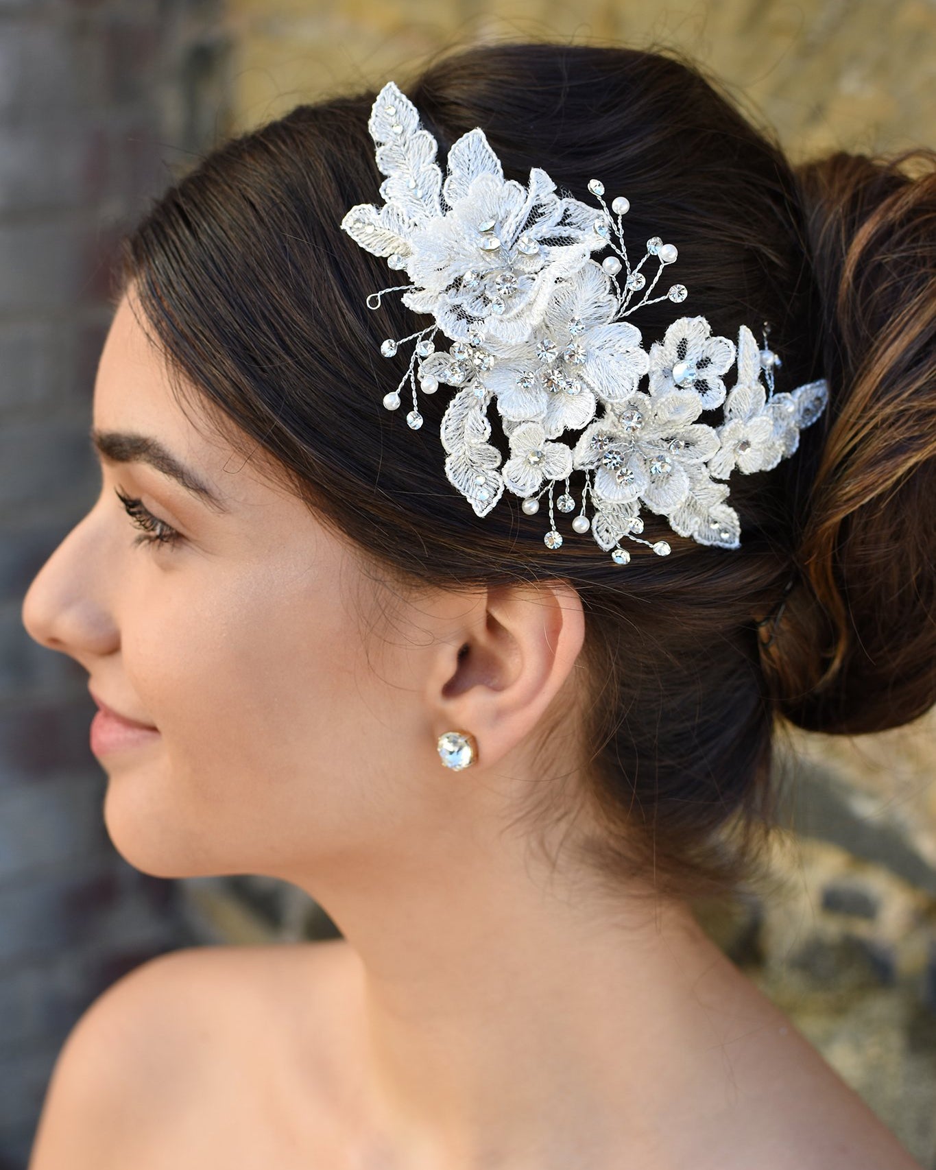 Lace and Silver side comb with pearl shown on lovely Bride