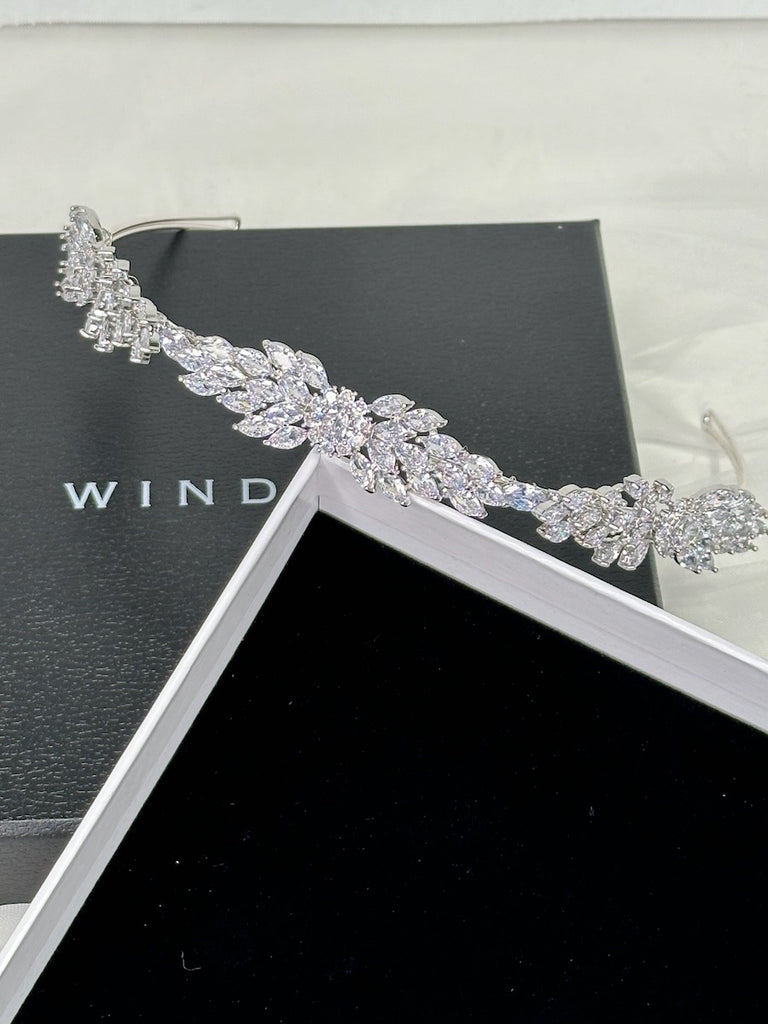 A modern bride headband silver crystal shown displayed in its box