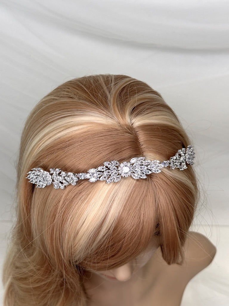 Loxley Bridal Headband a silver crystal headband shown on a model head