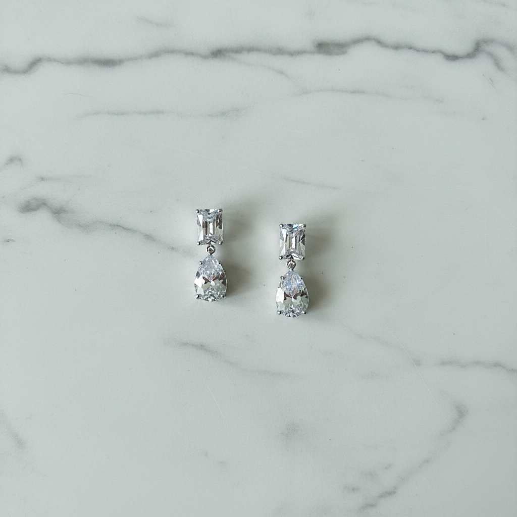 Ada White Gold Bridal Earring - white marble flat lay