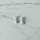 Ada White Gold Bridal Earring - white marble flat lay