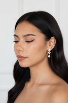 Bettie Gold Bridal Earring - front-facing bridal portrait on model