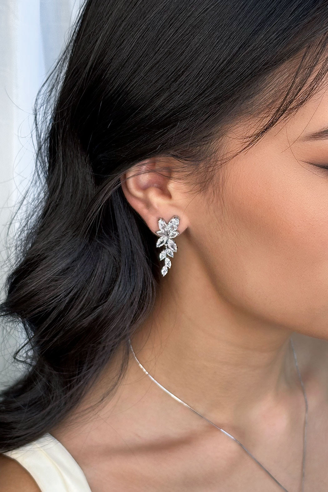 Celia Bridal Earring worn by a dark haired model