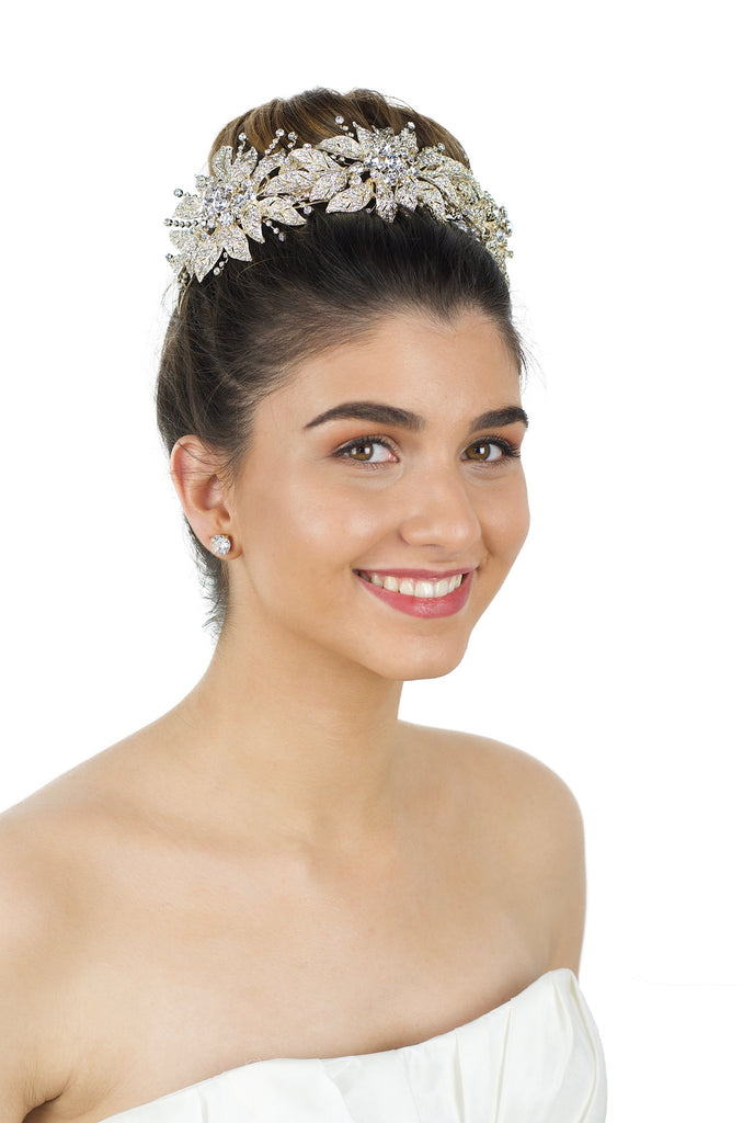 Bridal Crown in Pale Gold and large flowers worn by smiling bride