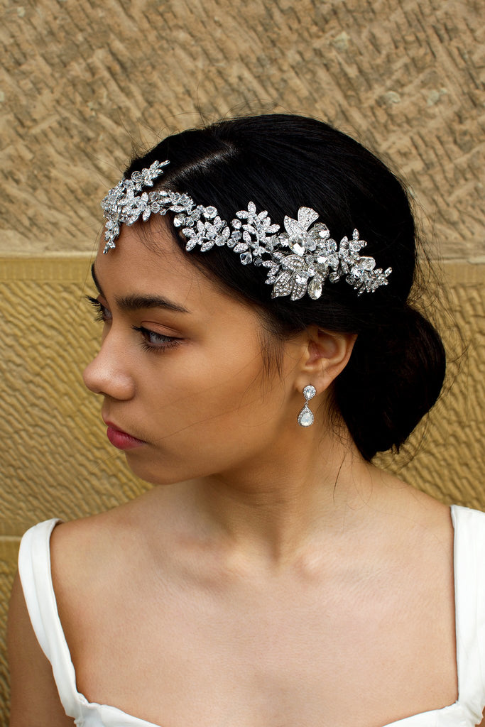 Long Bridal Vine covered in tiny crystals worn by a dark hair model 