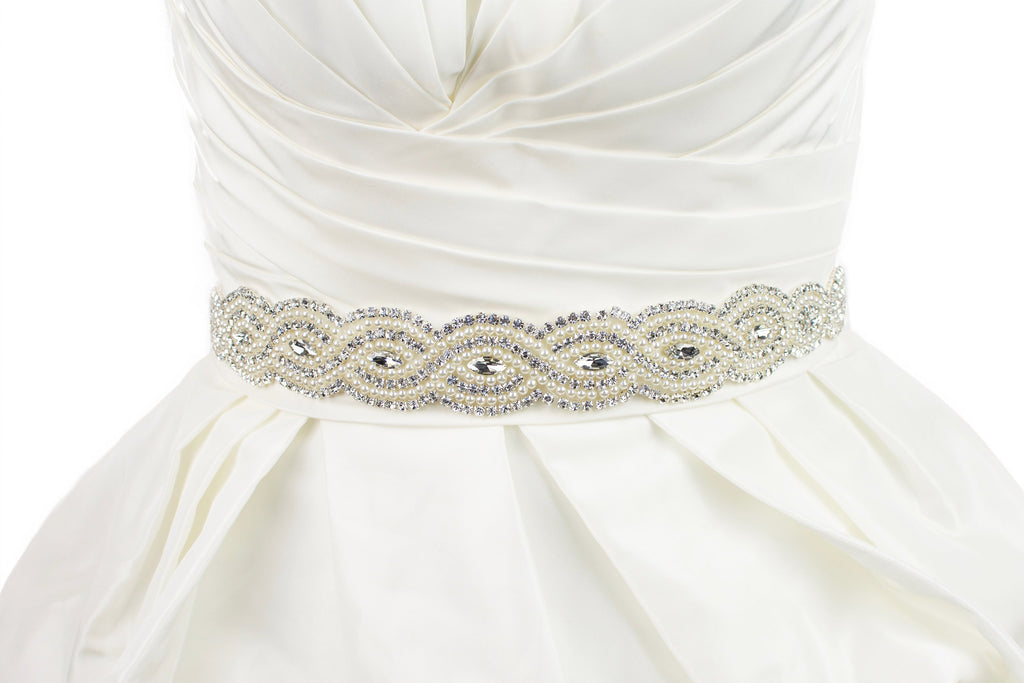 Bridal Sash with rows of pearls and stones worn on a bridal gown in Ivory colour