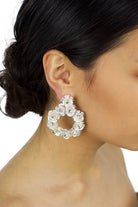 Soft Silver Flowers Bridal Earring worn by a bride with up hairdo