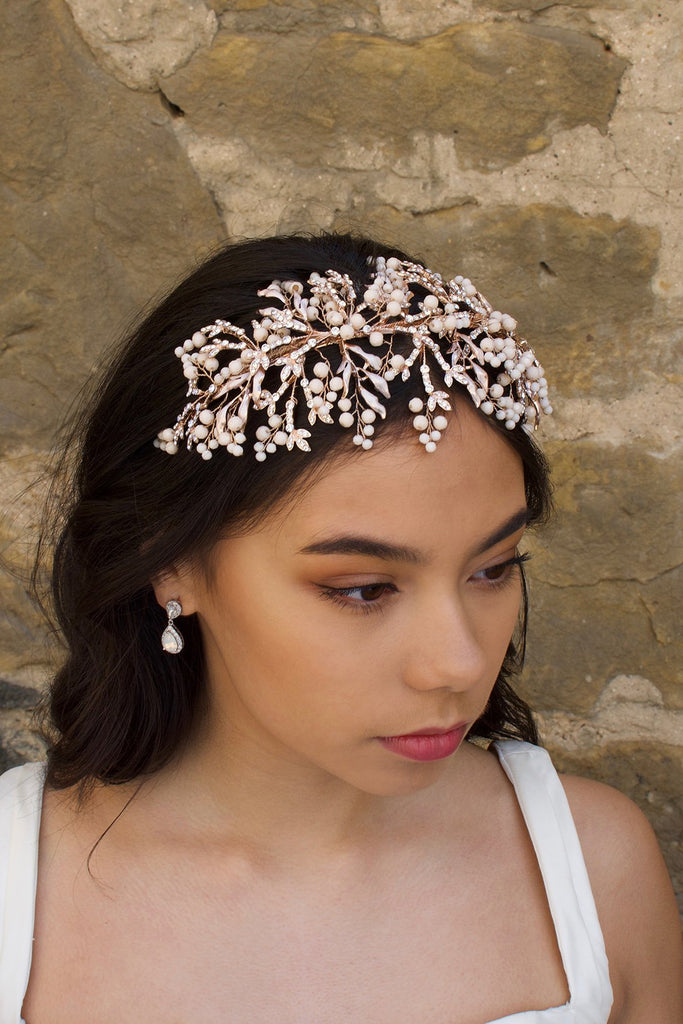 Rose Gold Headband with coral colour beads  on a dark haired bride