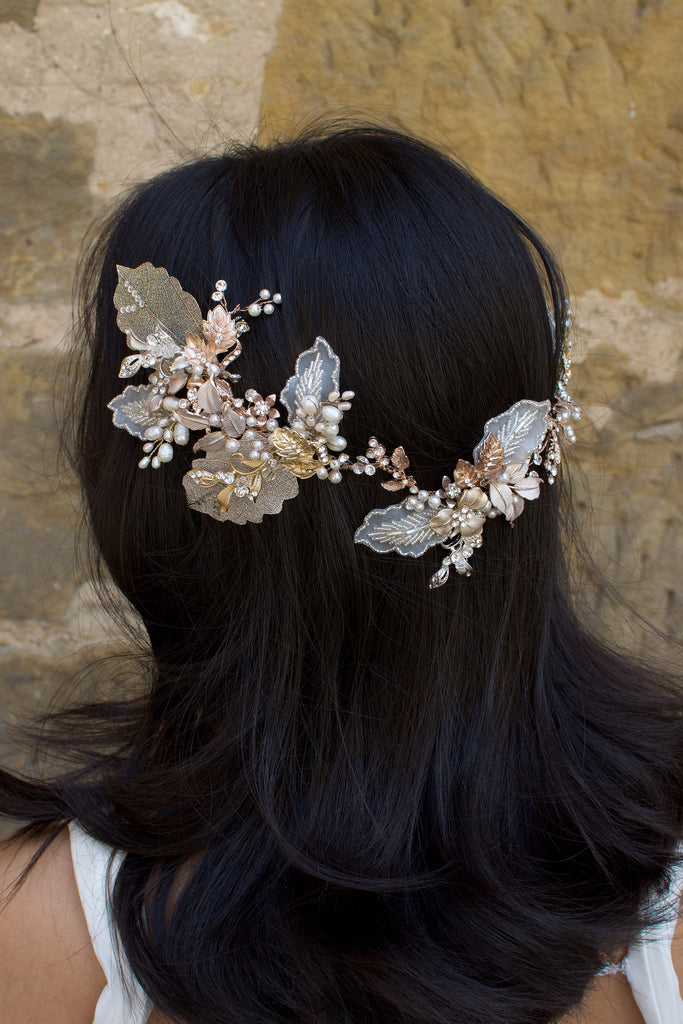 A dark haired model with hair down wears a Bridal Vine in Silver, Gold and Rose Gold 