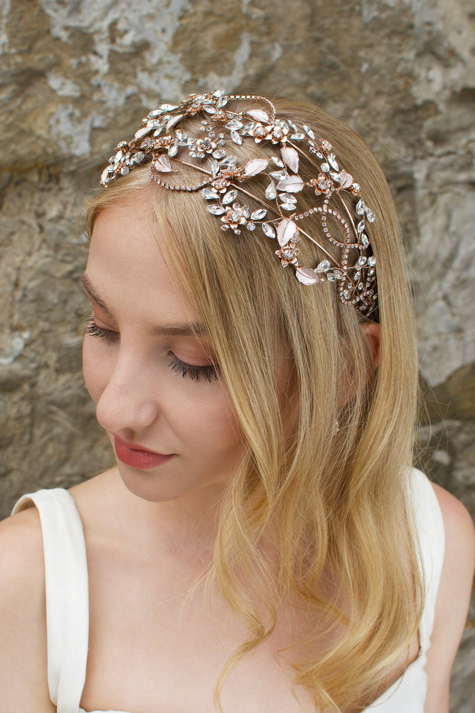 Rose Gold headband with clear stones worn by a bride