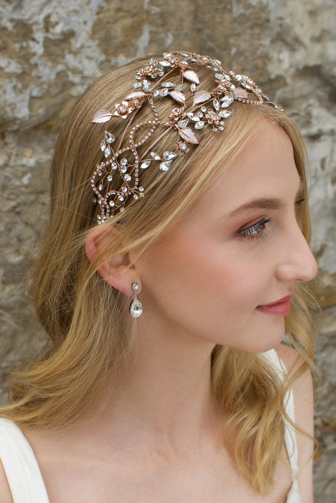 Rose Gold wide headband with clear stones worn by a blonde model