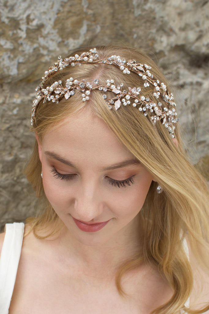 Double row pearl and rose gold headband worn by a blonde model