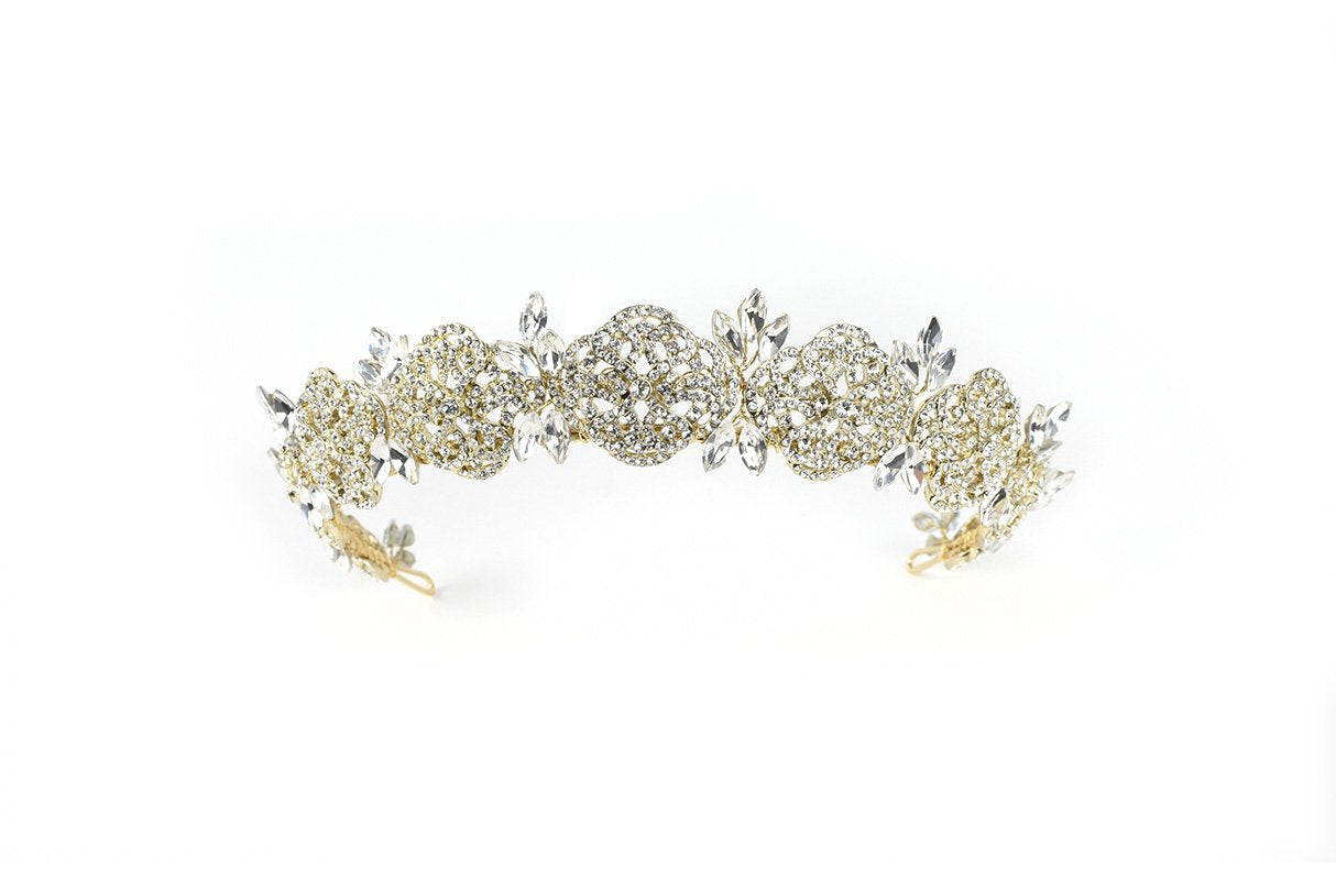 A Pale Gold crown against a bright white background. It has a full cover of tiny crystals