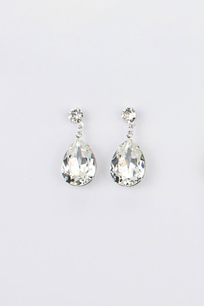 Bright Silver earring in a pear shape with clear swarovski stones