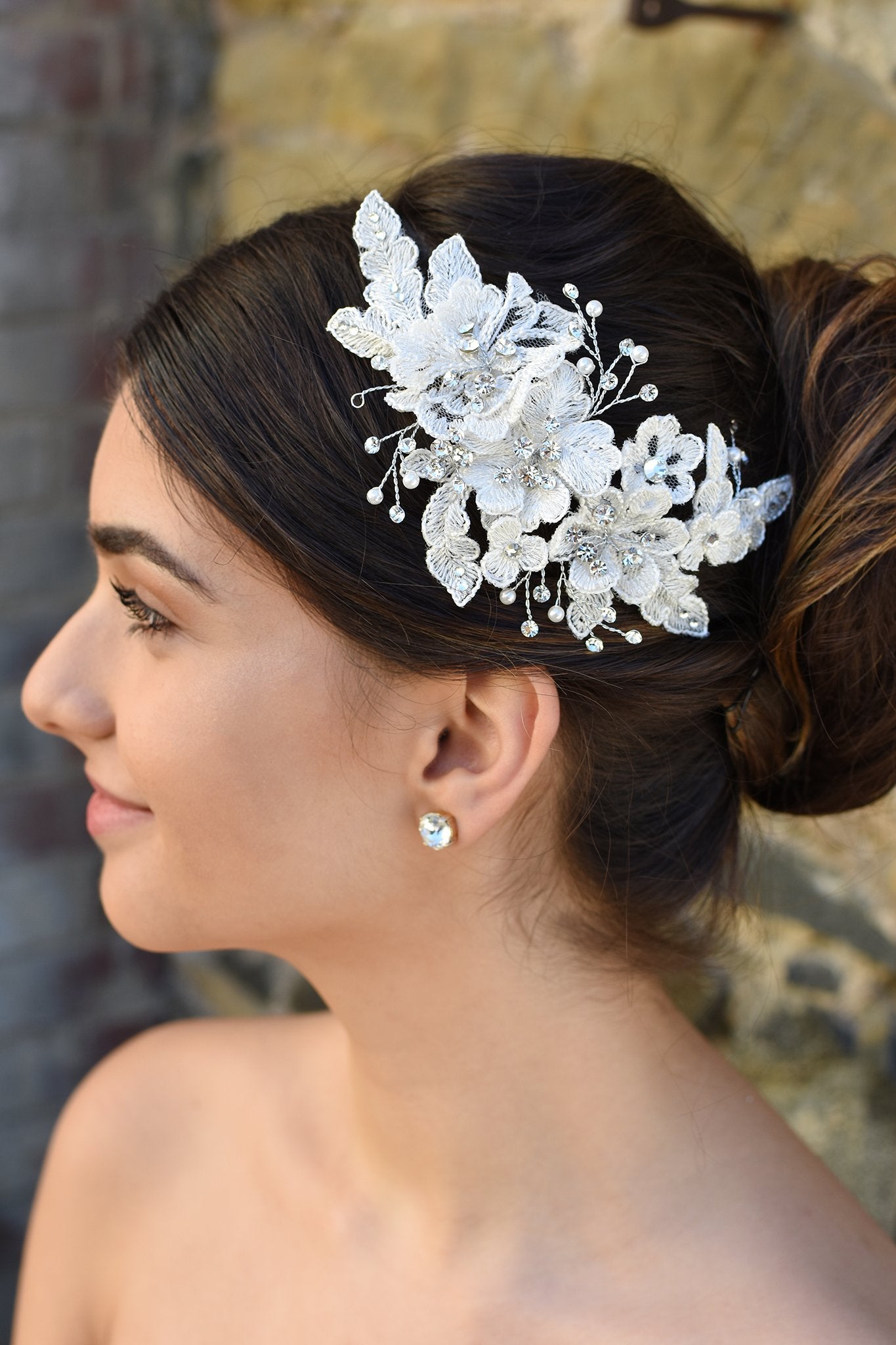 Lace and Silver side comb with pearl shown on lovely Bride